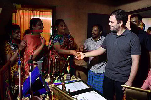 Rahul Gandhi interating with residents of flood-affected Wayanad. (Photo | @RGWayanadOffice/Twitter)