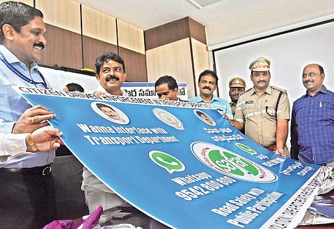 Vijayawada city police with banner of ATCS (Photo |EPS)