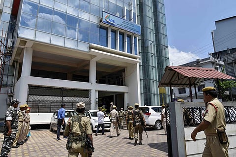 Security personnel stand guard outside an NRC centre before the final draft publication in Guwahati Friday August 30 2019. | PTI