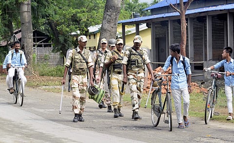 Security personnel patrol a road ahead of publication of the final draft of the National Register of Citizens NRC at Buraburi in Morigaon Saturday August 31 2019. | PTI