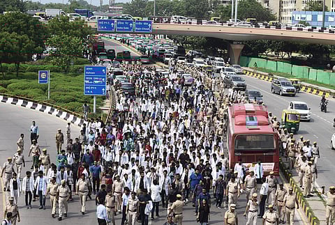 Members of Resident Doctors Association (RDA) and MBBS students shout slogans as they protest against the National Medical Commission (NMC) Bill near All India Institutes of Medical Sciences (AIIMS) in New Delhi on 1 August 2019. (Photo | Parveen Negi, EP