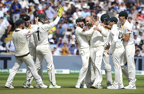 Australia's Nathan Lyon, centre right, celebrates with teammates after dismissing England's Jason Roy. (Photo | AP)