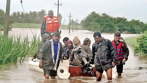 State Disaster Relief Force personnel rescue flood-affected people at Manjiri village of Chikkodi taluk in Belagavi district on Sunday | Express
