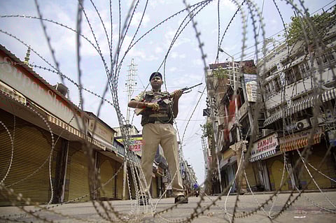 Restrictions and night curfews were imposed in several districts of Jammu and Kashmir as the Valley remained on edge with authorities stepping up security deployment. (Photo | PTI)