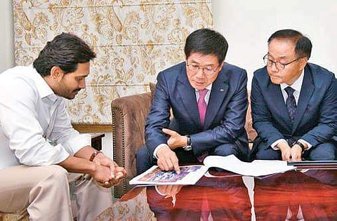Kia Motors MD Cuuk Hoon Shim and chief administrative officer Thomas Kimm meets CM Jagan Mohan Reddy in Vijayawada on Monday (Photo | EPS)