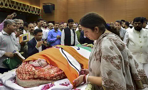 Union Minister Smriti Irani pays her last respects to former external affairs minister Sushma Swaraj at BJP headquarters in New Delhi on 7 August 2019. (Photo | PTI)