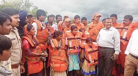 Eighteen people were rescued from a submerged island in Lingsugur of Raichur by an  NDRF team on Tuesday | Express