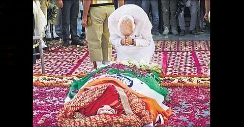 Prime Minister Narendra Modi pays homage to former External Affairs Minister Sushma Swaraj before her funeral in New Delhi. (Photo | PTI)