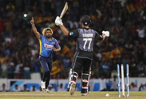 Sri Lanka's Lasith Malinga celebrates the wicket of New Zealand's Colin de Grandhomme during the first T20I in Pallekele (Photo | AP)