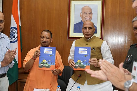 Defence Minister Rajnath Singh and Uttar Pradesh CM Yogi releasing the DefExpo Brochure in Lucknow on September 10. | Express Photo Services