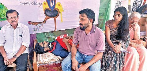 Members of the Aikya Malayala Prasthanam on hunger strike in front of the Kerala State Public Service Commission  headquarters at Pattom  Vincent Pulickal