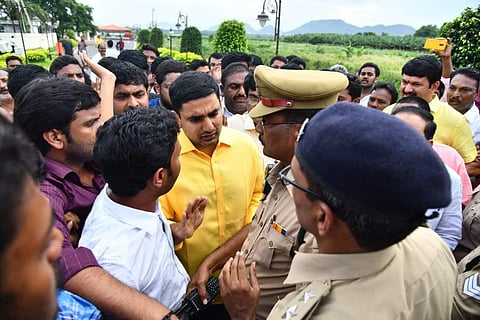 Police stop TDP general secretary Nara Lokesh at his residence during Chalo Atmakur programme in Undavalli near Vijayawada. (Photo | EPS)