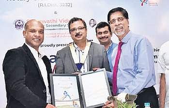 Former India batsman K Srikkanth honouring Patrick Rajkumar (left)