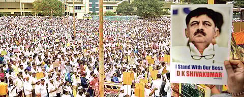 Members of Vokkaliga groups at a protest rally against the arrest of D K Shivakumar, in Bengaluru on Wednesday | Shriram B N