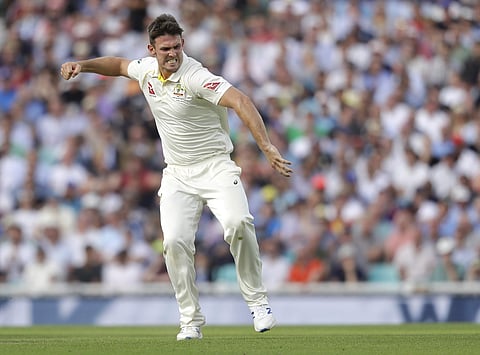 Australia's Mitchell Marsh celebrates taking the wicket of England's Sam Curran. (Photo | AP)