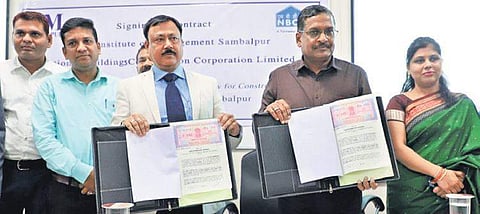 Director, IIM-S Mahadeo Jaiswal and GM (Engg), NBCC India AK Shome at the contract signing ceremony | Express