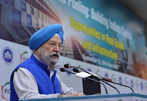 Union Minister for Housing and Urban Affairs Hardeep Singh Puri addresses during the inaugural conference of Land Pooling Building India's Capital at FICCI in New Delhi (Photo| PTI)
