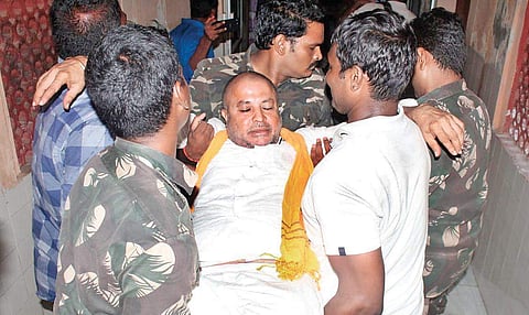 Police taking former TDP MLA Chintamaneni Prabhakar away after arrest (Photo |EPS))