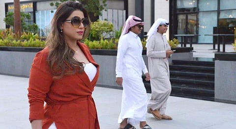 Saudi human resources professional Mashael al-Jaloud, 33, walks in western clothes at a commercial area in the Saudi capital Riyadh. (Photo | AFP)