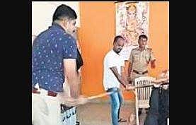 Video grab of the inspector thrashing the suspect