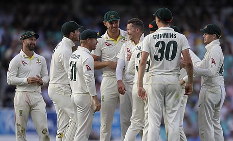 Australia's players celebrate taking the wicket of England's Jos Buttler during the third day of the fifth Ashes test match between England and Australia at the Oval cricket ground in London, Saturday, September 14, 2019. | AP