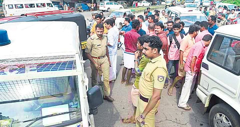 Police taking into custody Binu, Libin and his gang near Thodupzha private bus stand on Saturday | Express