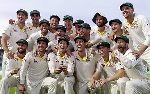 Australian cricket team poses with the Ashes urn. (Photo | AP)