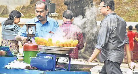 Continuous raids are being conducted by health  squads at the food stalls set up at various venues of the Onam fest in the city. A customer waiting in front of a corn selling stall near Kanakakunnu  B P Deepu
