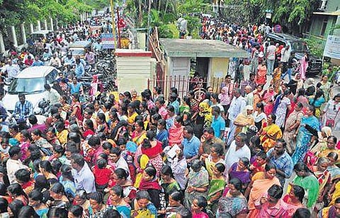 People thronging the Spandana cell at the VMC office; (bottom) an elderly couple at the sub-collector’s office in Vijayawada I Prasant Madugula