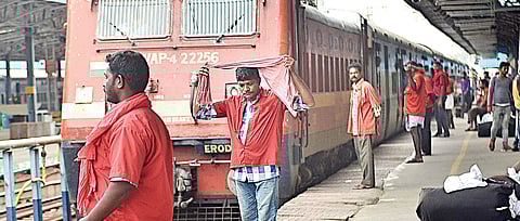 Porters waiting for a train’s arrival at Chennai Central. (EPS |  D Sampathkumar)