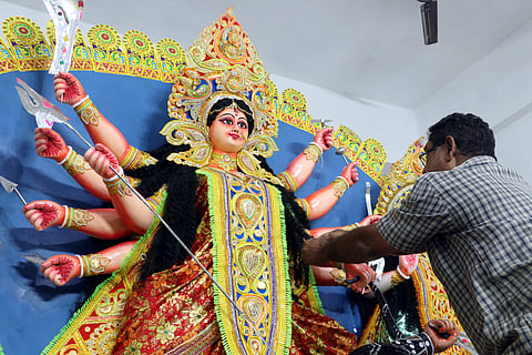 BJP will rope in Union home minister Amit Shah in Kolkata to inaugurate at least four Durga puja pandals. (File | EPS)