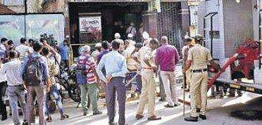 Rescue personnel outside Farah Towers on Wednesday| Pandarinath B
