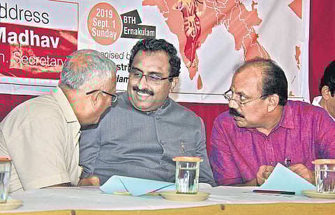 BJP national general secretary Ram Madhav interacting with Lt-Gen Sarath Chand at ‘New India New Kashmir’meet organised by BJP district committee in Kochi on Sunday. Party state general secretary A N Radhakrishnan is also seen | ARUN ANGELA