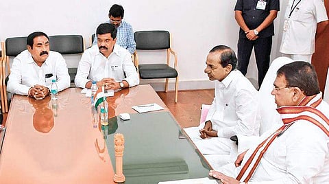 Chief Minsiter K Chandrasekhar Rao speaks to MLAs from Nizamabad in his chamber in the Assembly on Thursday