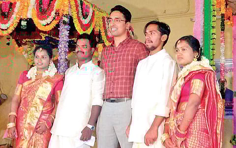 District Collector P B Nooh with the couples who got married in Pathanamthitta Mahila Mandiram last month