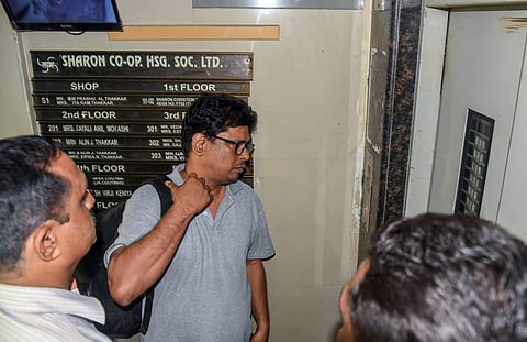 Social activist-lawyer Arun Ferreira looks on after he was brought back to his residence and placed under house arrest in Thane on August 30 2018. (Photo | PTI)