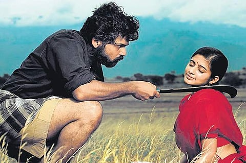 Karthi and Priyamani in Paruthiveeran