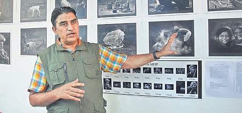 T Srinivasa Reddy, who received the MFIP Award displays his photographs at the cultural centre in the city |  P Ravindra Babu