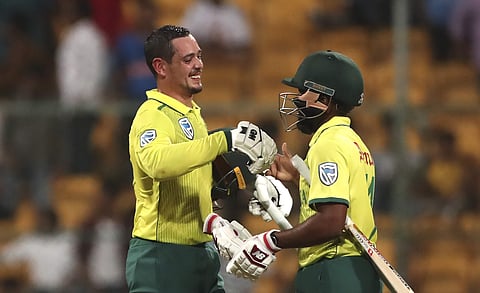 South Africa's captain Quinton de Kock, left, celebrates with his batting partner Temba Bavuma after their win in the third and last T20 match. (Photo | AP)