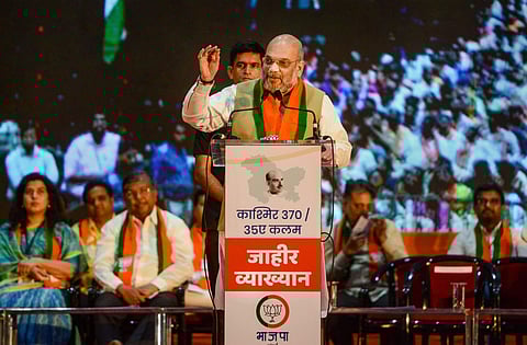 Home Minister Amit Shah speaks during a rally on the Centre's decision to abrogate Article 370 in Jammu and Kashmir and to campaign for next month's Maharashtra Assembly polls in Mumbai on Sunday. (Photo | PTI)