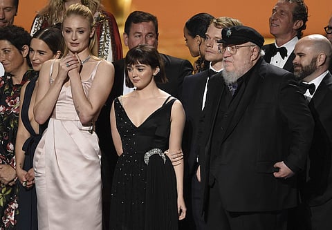 Emilia Clarke, from left, Sophie Turner, Maisie Williams, Alfie Allen, George R. R. Martin and crew of 'Game Of Thrones' accept the award for outstanding drama series at the 71st Primetime Emmy Awards on 22 September 2019. (Photo | AP)