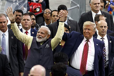 President Donald Trump and Indian Prime Minister Narendra Modi walk around NRG Stadium waving to the crowd. (Photo | AP)
