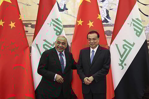 Chinese Premier Li Keqiang, right, and Iraqi Prime Minister Adil Abdul-Mahdi attend a signature ceremony at the Great Hall of the People in Beijing, China, Monday Sept. 23, 2019. (Photo | AP)