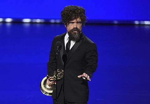 Peter Dinklage accepts the award for outstanding supporting actor in a drama series for 'Game of Thrones' at the 71st Primetime Emmy Awards. (Photo | AP)