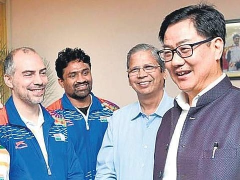 Boxing coaches Santiago Nieva (left), CA Kuttappa (2nd left), BFI executive director RK Sacheti with Sports Minister Kiren Rijiju (R) in New Delhi on Monday