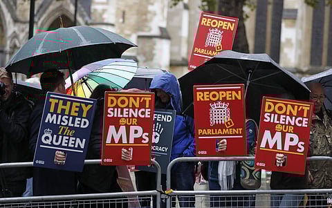 Anti-Brexit supporters gather in the rain outside the Supreme Court in London (Photo| AP)
