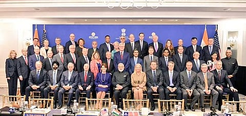 PM Modi with CEOs and business leaders. (Photo | Twitter/@MEAIndia)