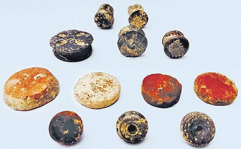 File photos of articles and other remains excavated from the archaeological site in Keezhadi in Sivaganga | express