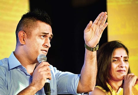 Rupa Gurunath (right) with MS Dhoni at the launch of ‘Veedu Kattu, Whistle Podu” | D Sampath Kumar