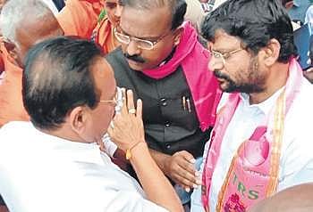 TRS MP B Venkatesh and MLA K Chander argue with Union Fertiliser Minister  DV Sadananda Gowda on Thursday
